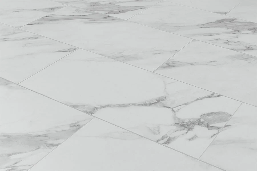 Audacity 12mm Laminate Tile White Marble Built-in Underlay - Image 3